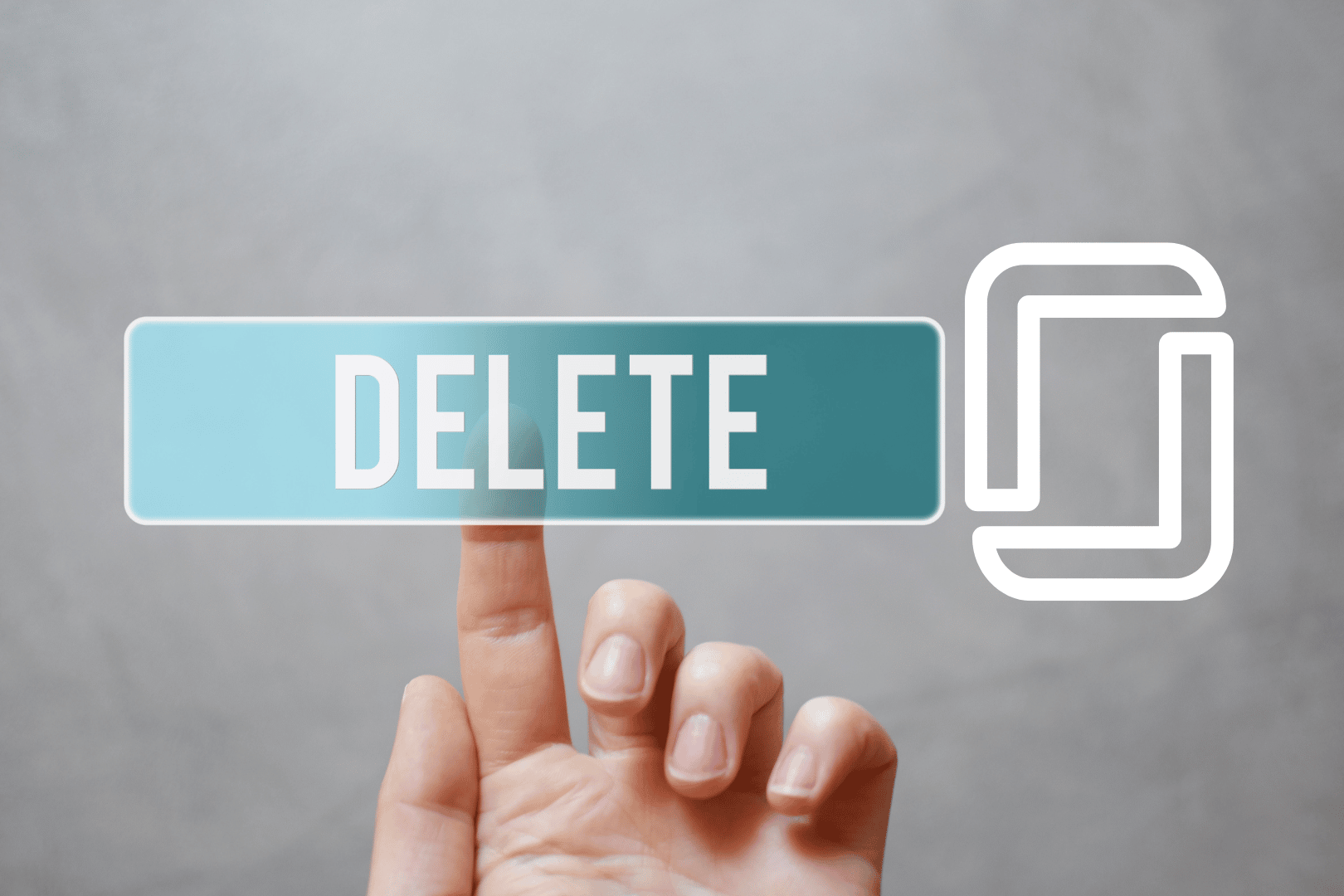 hand pressing delete button